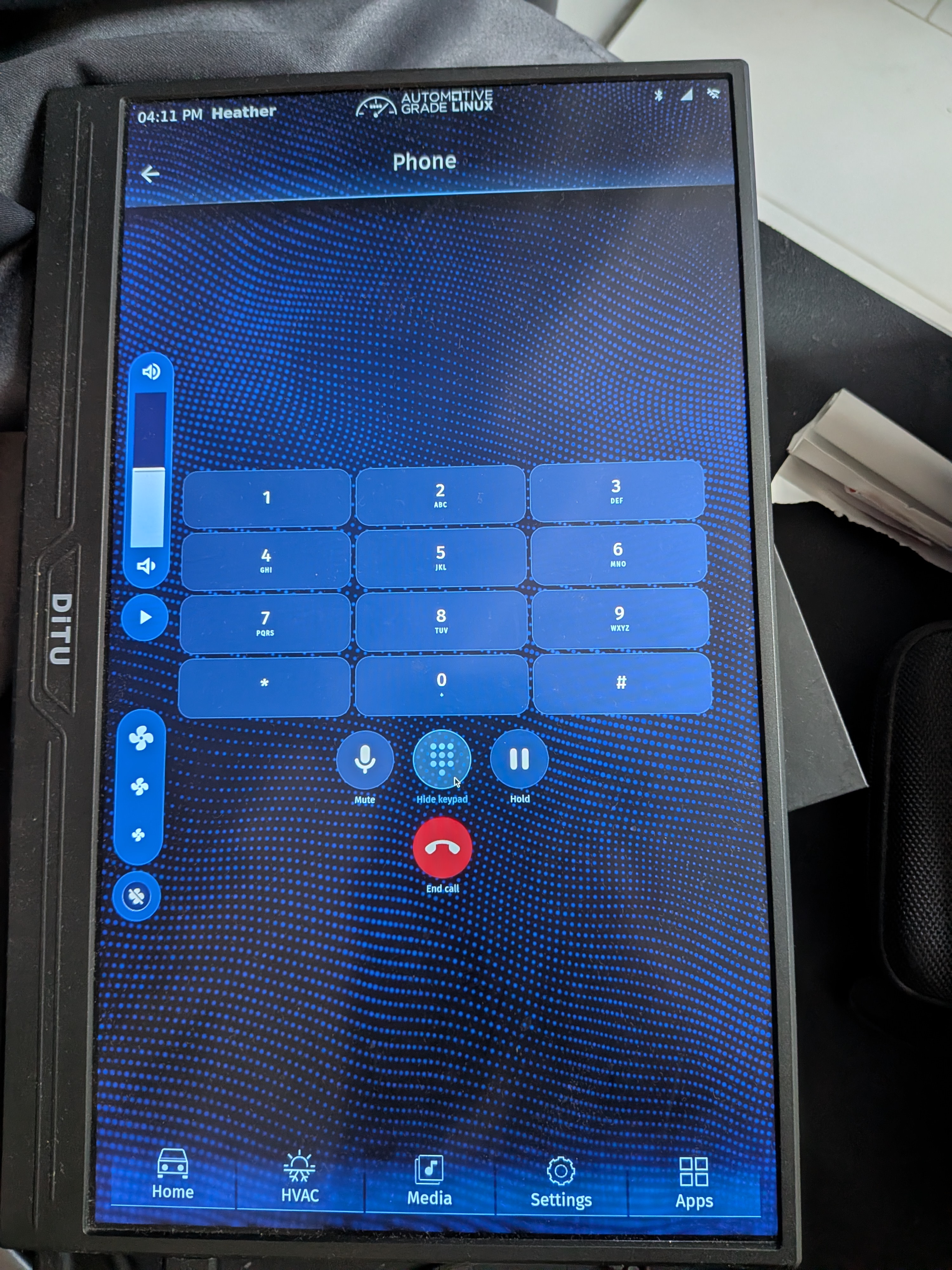 AGL in-call keypad showing DTMF keys, Mute, Hide keypad, Hold, and End call controls.
